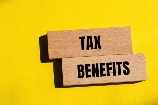 tax-benefits-words-written-wooden-blocks-with-yellow-background-conceptual-tax-benefits-symbol